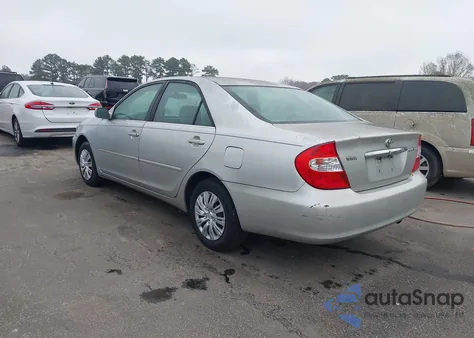 2003 Toyota Camry Le z USA, uszkodzony, nr VIN 4T1BE32K33U686148